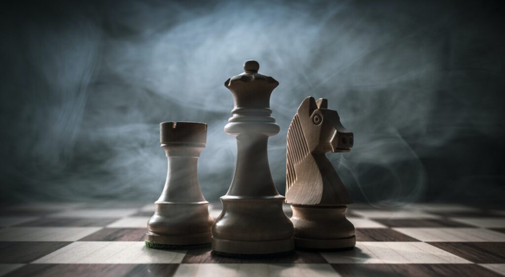 chess-pieces-on-the-chessboard-e1650513968591.jpg